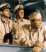 still from the movie the Caine Mutiny: (L to R) Keefer, Maryk, Queeg by MacMurray, Johnson, Bogart